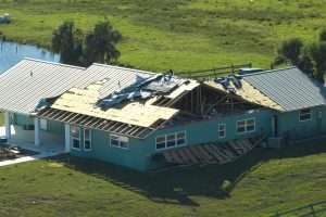 Hurricane destroyed house in Florida residential area. 