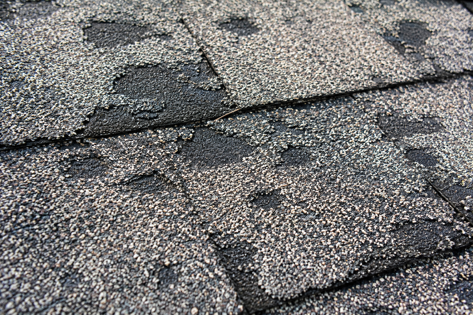 Surface of weathered asphalt shingles