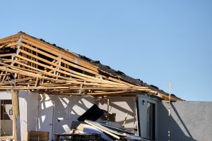 Badly damaged mobile home after hurricane Ian in Florida residential area.