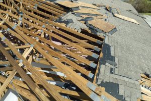 destroyed house roof in residential area